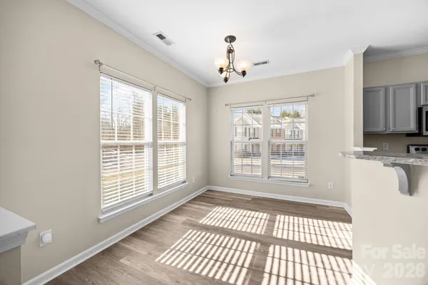 a view of a room with a large window