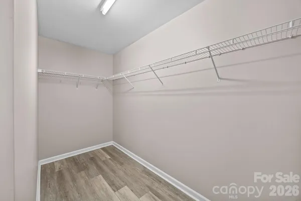 a view of a room with racks on the wall