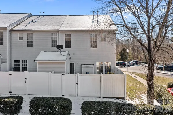 a view of roof deck with patio