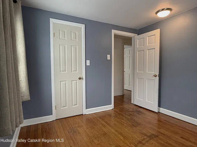a view of a livingroom with a staircase