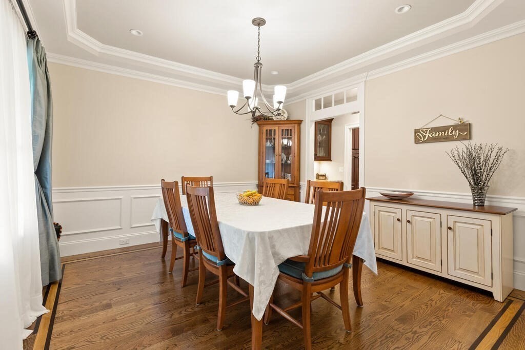 272 Boston Road Chelmsford, MA 01824 - Photo 12 of 42 a view of a dining room with furniture window and wooden floor
