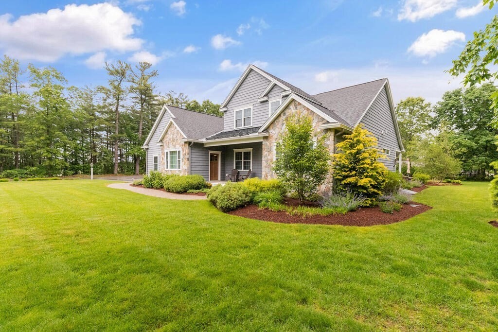 272 Boston Road Chelmsford, MA 01824 - Photo 3 of 42 a view of a house with a backyard and a tree