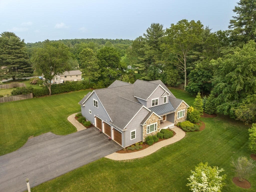 272 Boston Road Chelmsford, MA 01824 - Photo 4 of 42 an aerial view of a house with a big yard