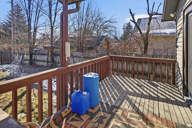 380 North 200 West Logan, UT 84321 - Photo 22 of 29 Wooden deck featuring a fenced backyard