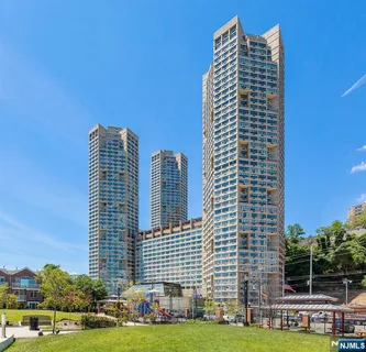 a view of a city with tall buildings