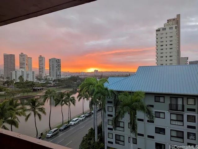 a view of a city with tall buildings
