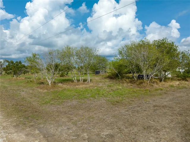 a view of a golf course with a lake