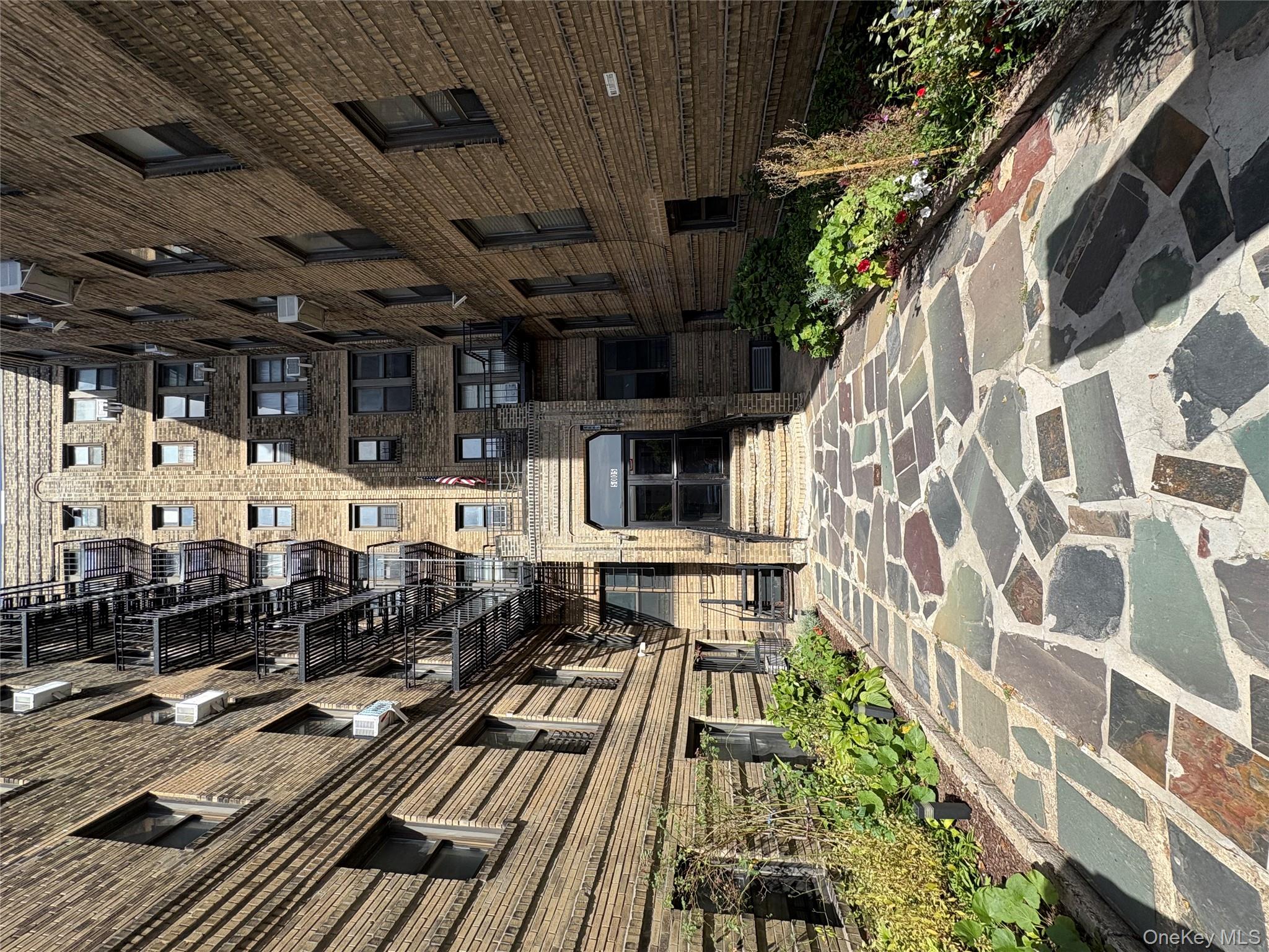 5005 43rd Avenue, Unit 5H Queens, NY 11377 - Photo 3 of 23 View of apartment building / complex