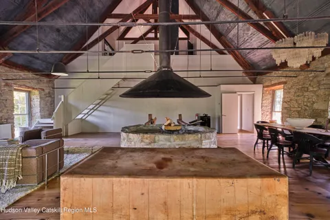 a living room with a couch and a table