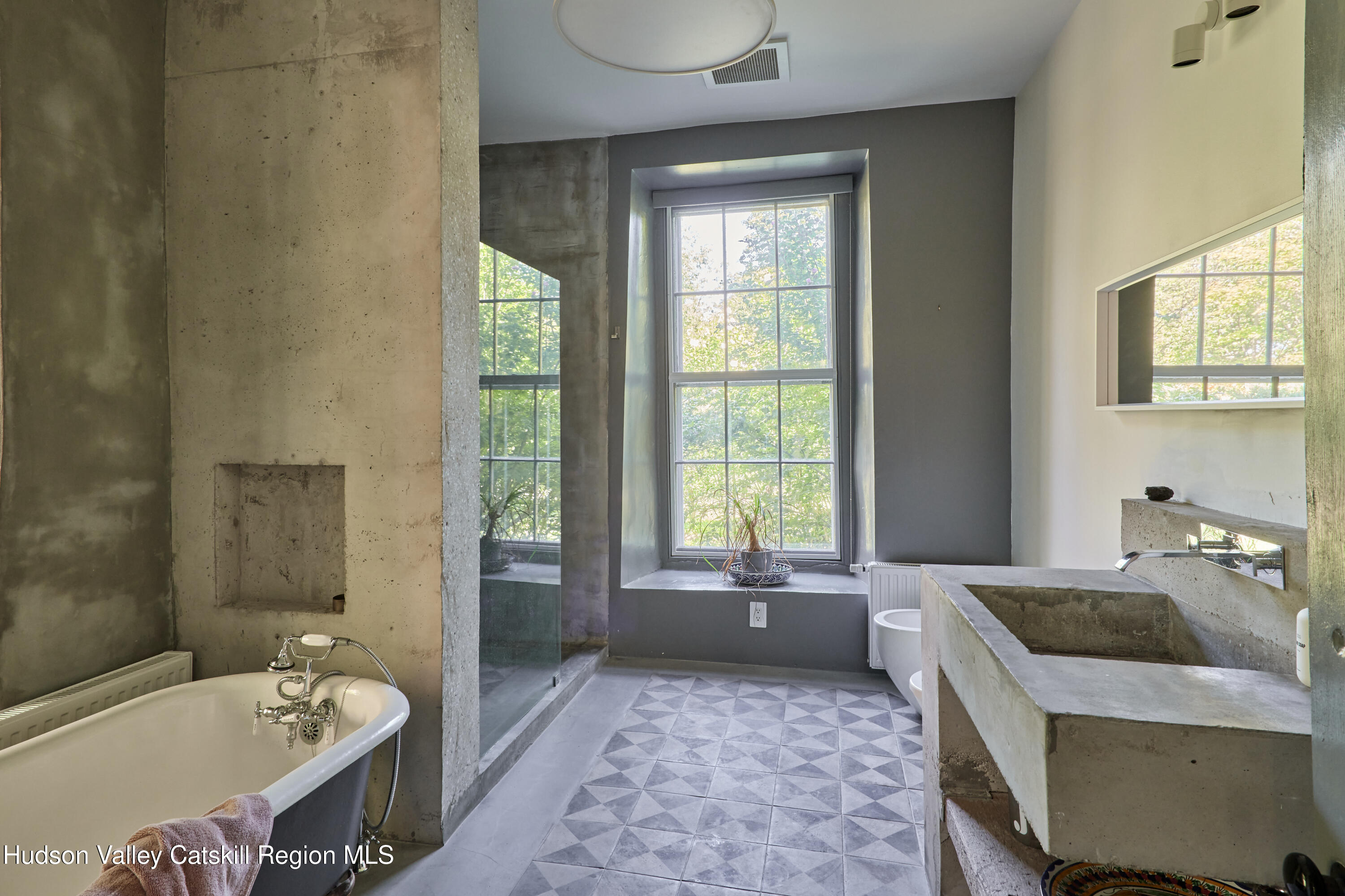 1883 Highway 213 Rifton, NY 12471 - Photo 31 of 50 a bathroom with a granite countertop tub a sink and a bathtub