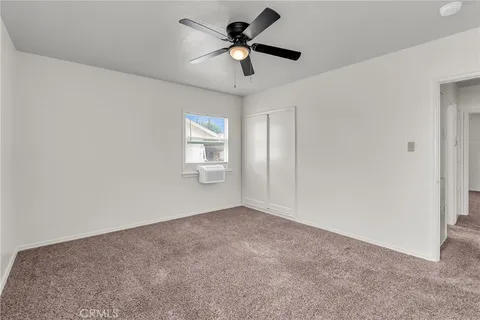 a bathroom with a shower sink and mirror