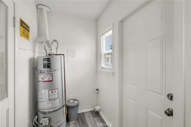 a view of a house with a yard and garage