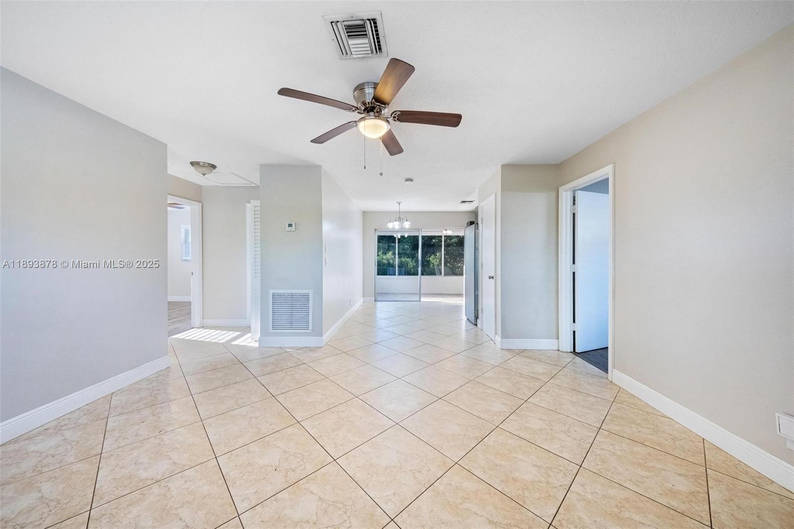 3589 Island Road Palm Beach Gardens, FL 33410 - Photo 20 of 40 a view of an empty room and window