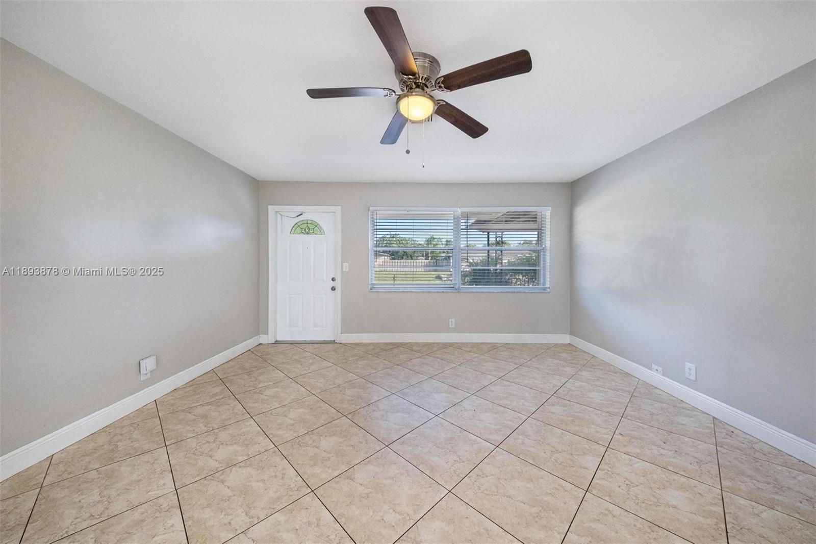 3589 Island Road Palm Beach Gardens, FL 33410 - Photo 22 of 40 a view of an empty room with a window