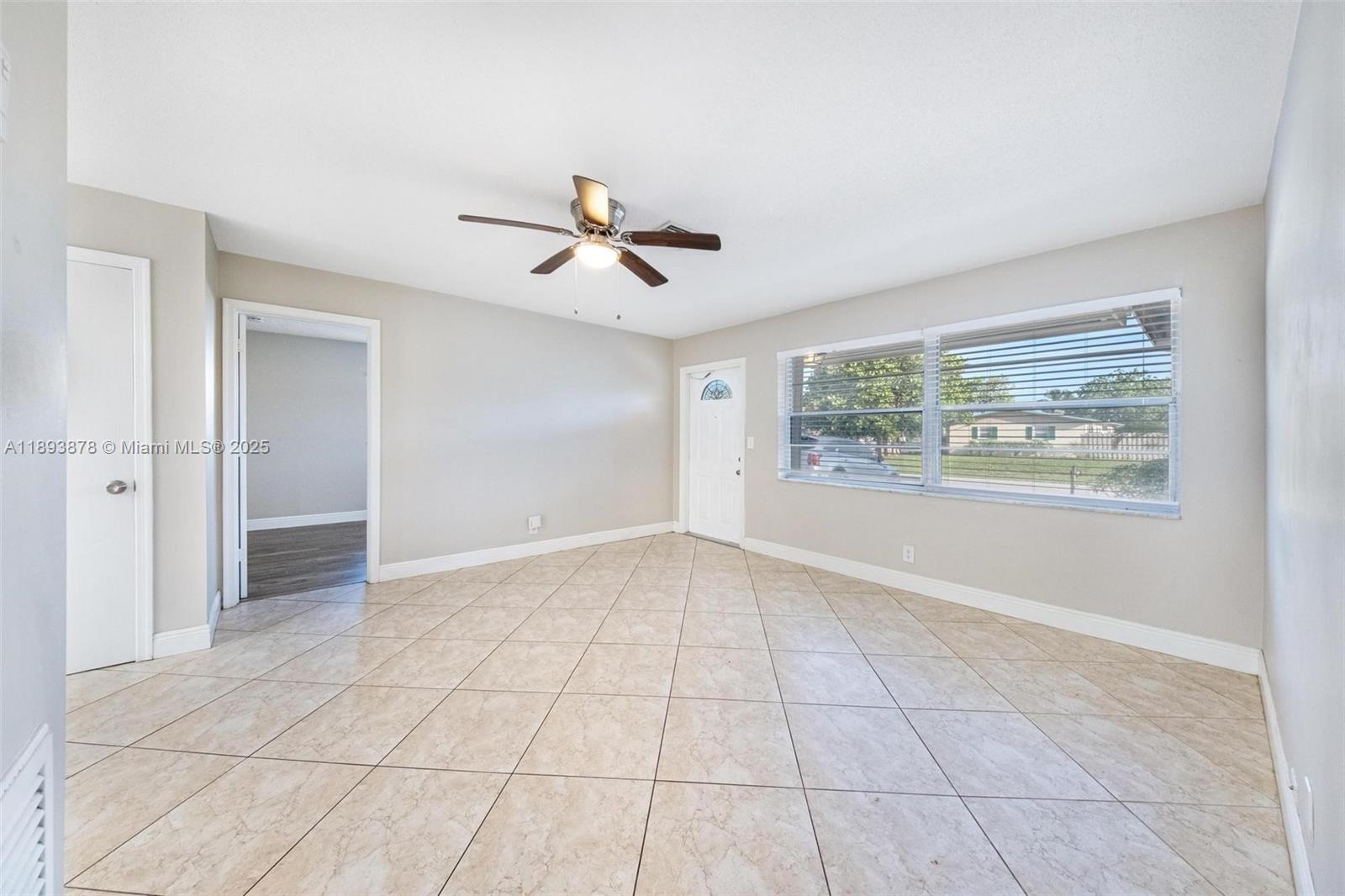 3589 Island Road Palm Beach Gardens, FL 33410 - Photo 23 of 40 a view of an empty room with a window