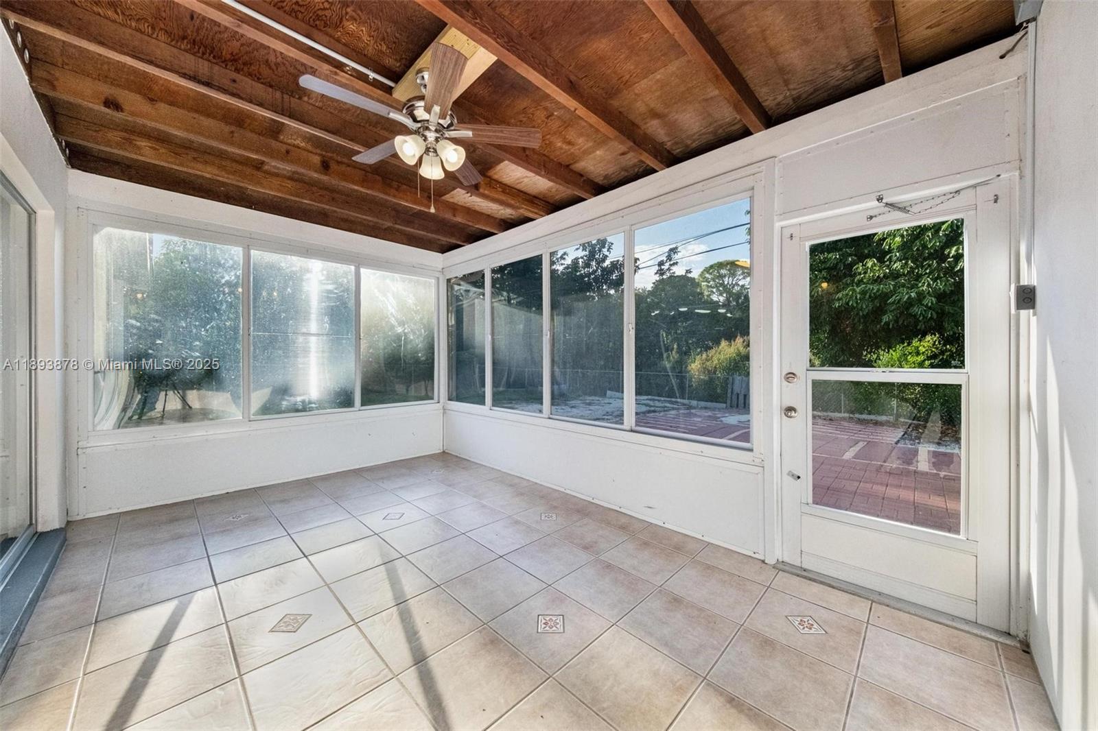 3589 Island Road Palm Beach Gardens, FL 33410 - Photo 24 of 40 a view of an entryway with a glass door