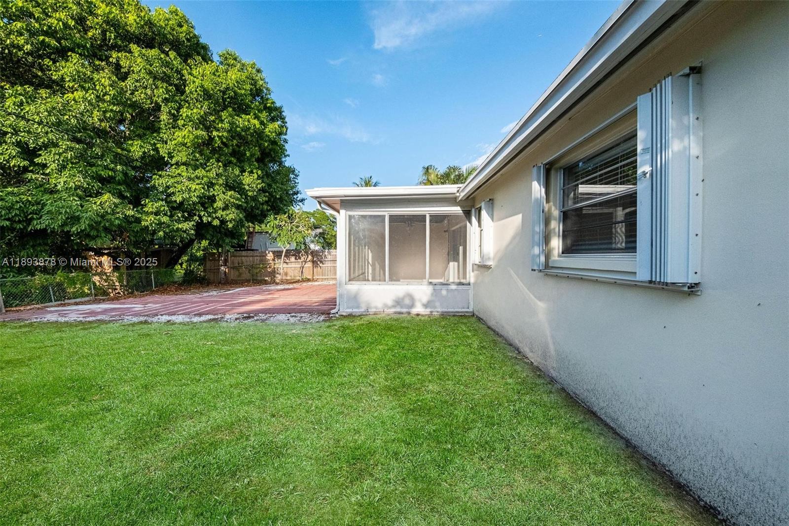 3589 Island Road Palm Beach Gardens, FL 33410 - Photo 34 of 40 a view of house with backyard
