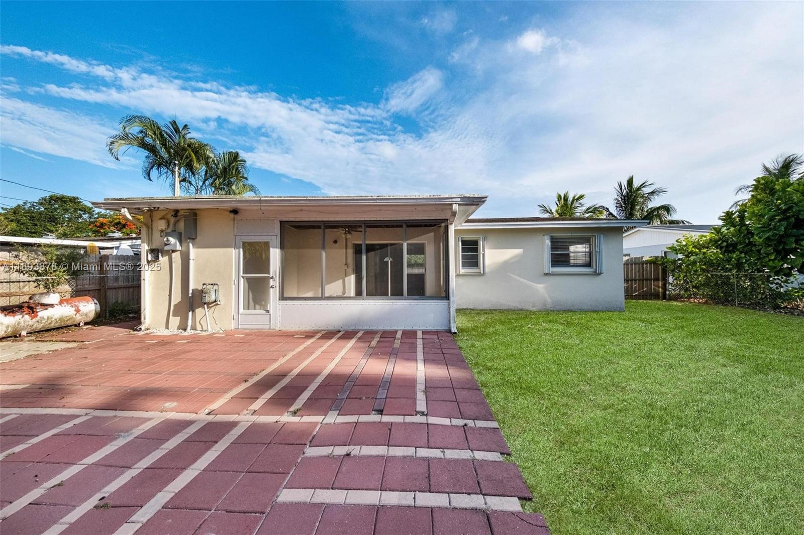 3589 Island Road Palm Beach Gardens, FL 33410 - Photo 37 of 40 a view of outdoor space yard and front view of a house