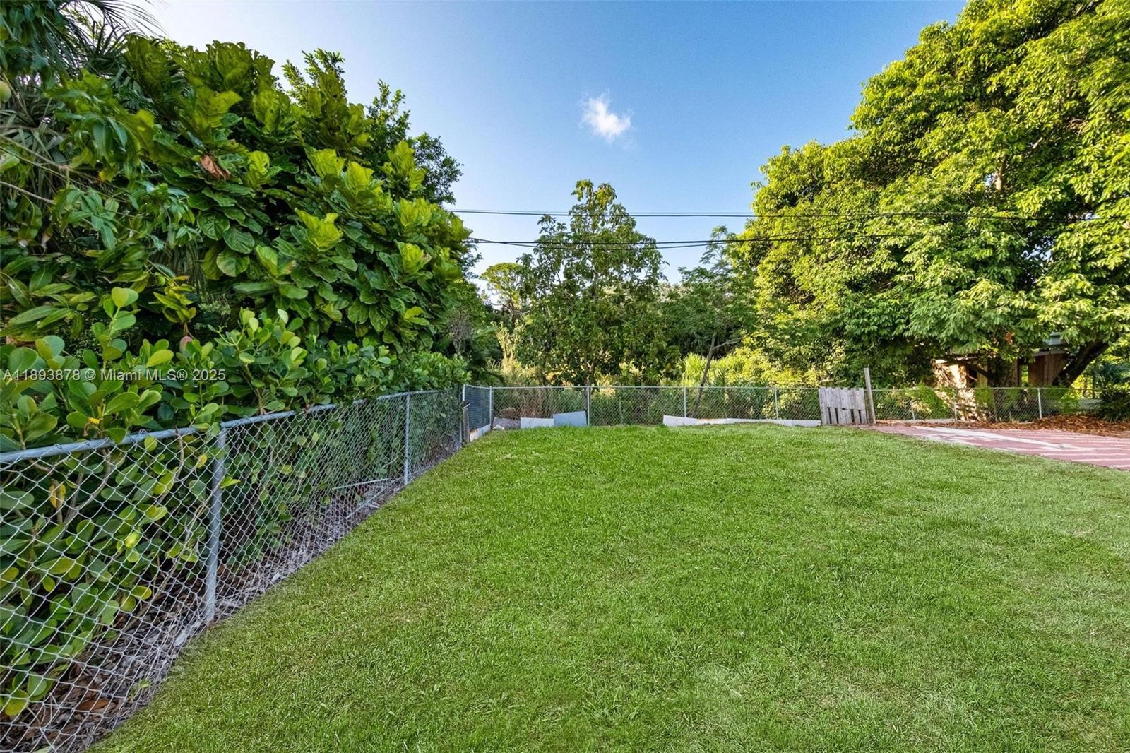 3589 Island Road Palm Beach Gardens, FL 33410 - Photo 40 of 40 a view of a park with large trees
