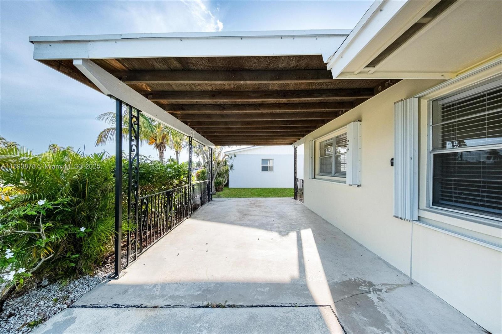 3589 Island Road Palm Beach Gardens, FL 33410 - Photo 6 of 40 a view of backyard of the house