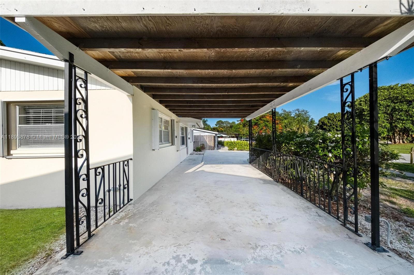 3589 Island Road Palm Beach Gardens, FL 33410 - Photo 7 of 40 a view of a porch
