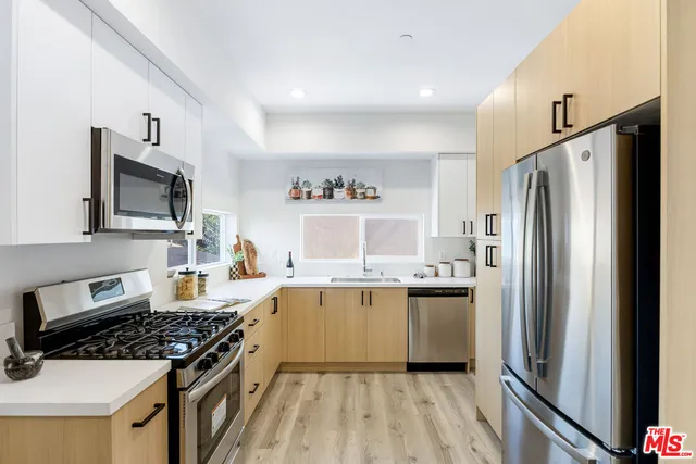 a workspace with furniture and a window