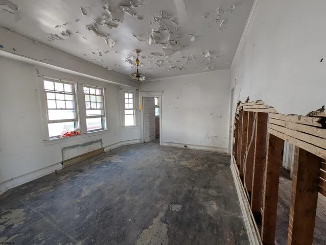 a refrigerator freezer sitting inside of a kitchen