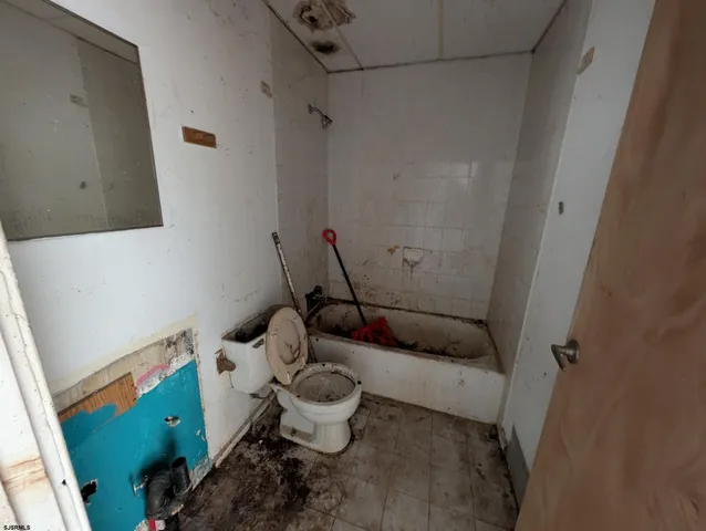 a bathroom with a sink and toilet