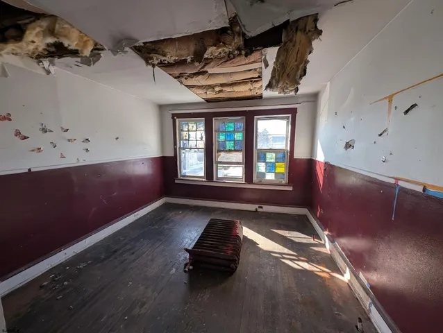 an empty room with windows