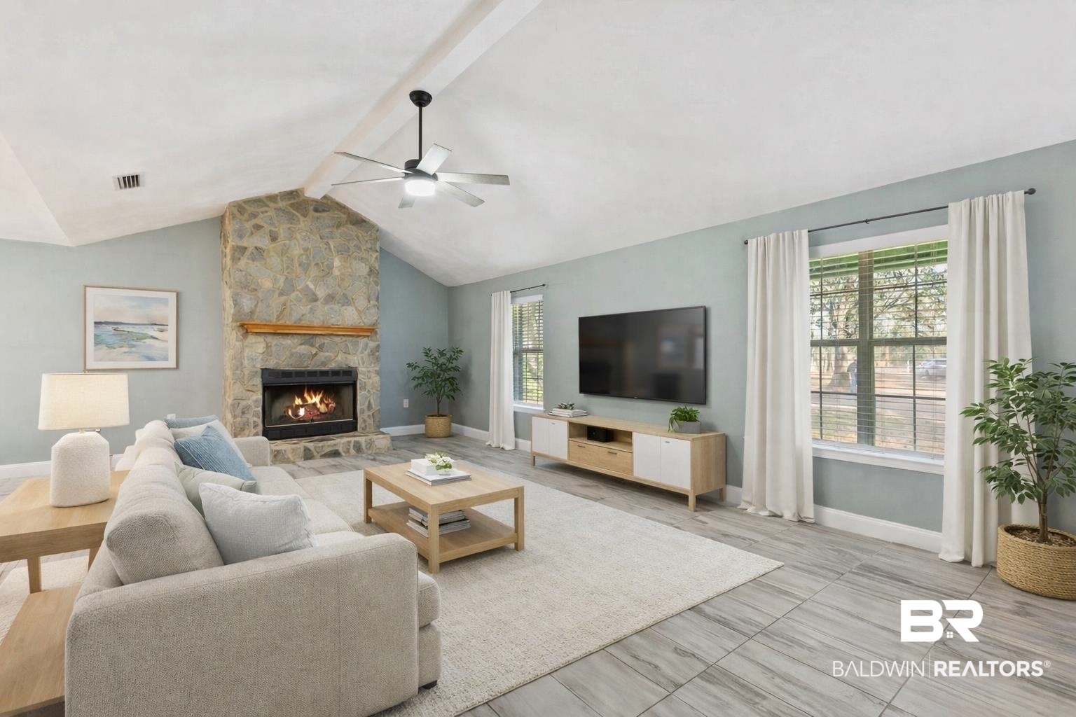 17366 Old Brady Road Bay Minette, AL 36507 - Photo 7 of 43 Living room with a stone fireplace and a ceiling fan