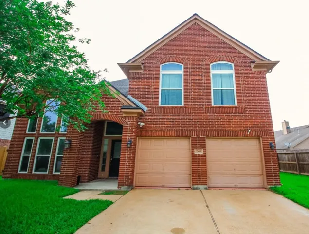 a front view of house with yard