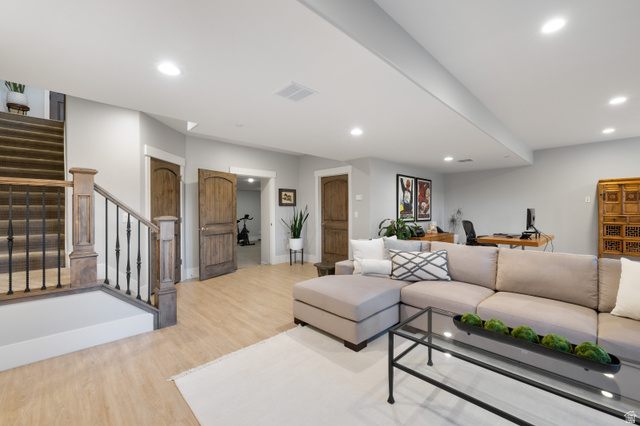 1737 East Viewside Circle Hideout, UT 84036 - Photo 18 of 35 Spacious finished basement featuring light wood-finish flooring and recessed lighting
