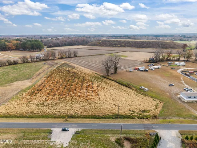 a view of swimming pool with a table and chairs
