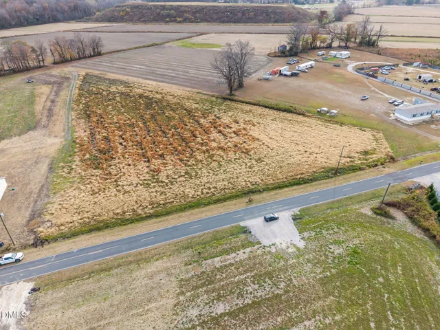 a view of water heater and wooden floor