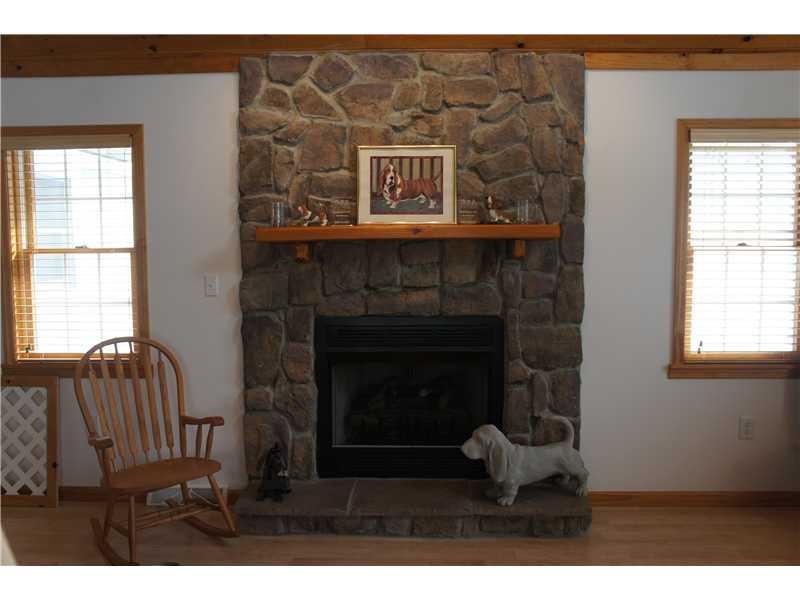 510 Upper Cherry Run Road Rural Valley, PA 16249 - Photo 11 of 25 Family Room. Beautiful stone gas fireplace!