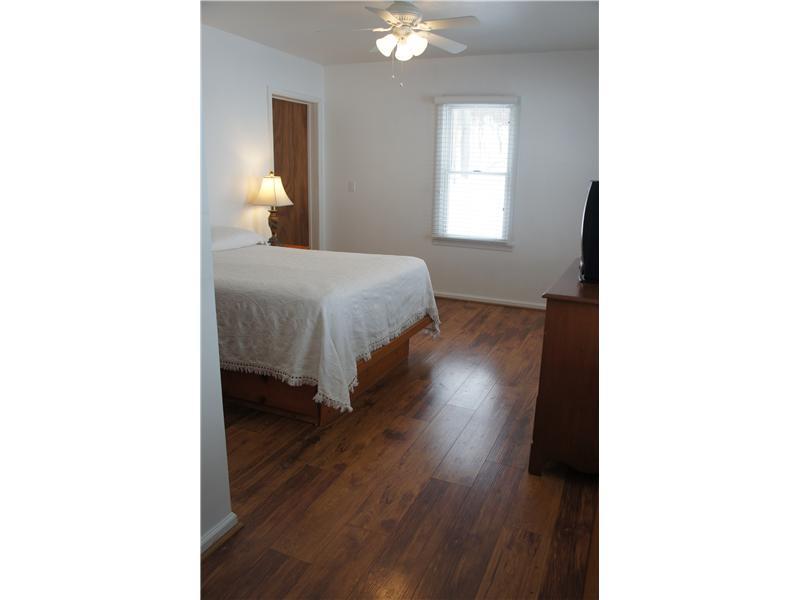 510 Upper Cherry Run Road Rural Valley, PA 16249 - Photo 18 of 25 Bedroom. There is a bright and spacious bedroom on the main level with it s own full bathroom, double door closet and a walk in closet off of the bathroom!