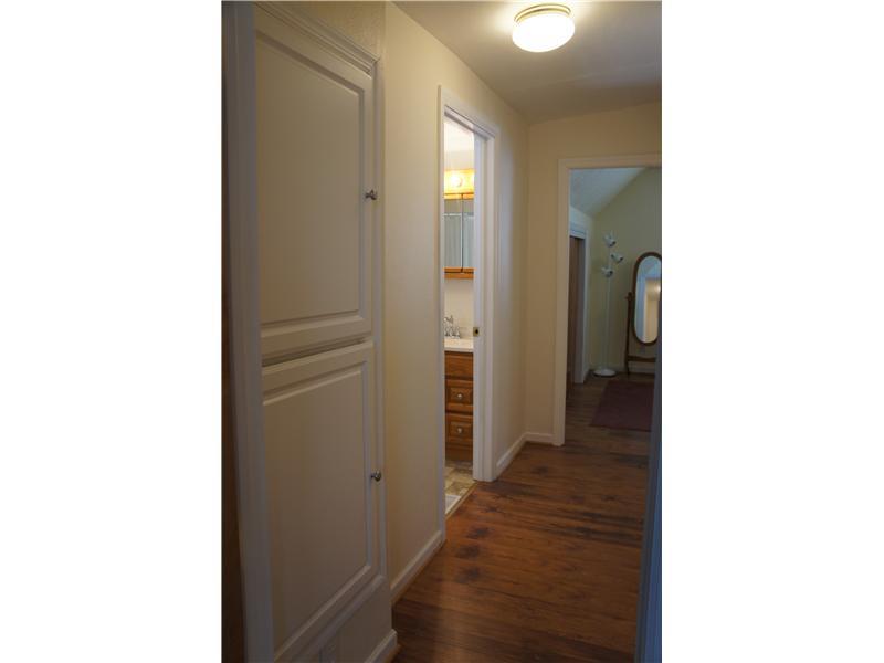 510 Upper Cherry Run Road Rural Valley, PA 16249 - Photo 20 of 25 Other. View of the upper level hallway. Upper level has two large bedrooms, both with good closet space and a large full bathroom! Notice the extra built in storage in the hallway!