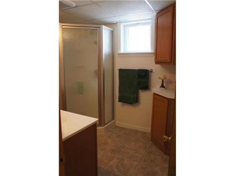 510 Upper Cherry Run Road Rural Valley, PA 16249 - Photo 23 of 25 Full Bath. View of the lower level full bathroom...yes, a full bathroom on every level of the home! Please see attachments for additional pictures and info like the Reverse Osmosis machine located in this bathroom!