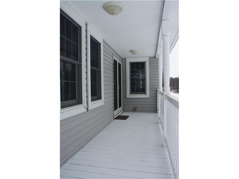 510 Upper Cherry Run Road Rural Valley, PA 16249 - Photo 7 of 25 Exterior Front. A large covered front porch leads to the entry - Double French Doors with screened storm doors. The whole home has beautiful new windows and doors!