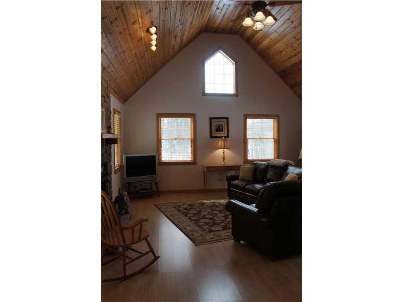 510 Upper Cherry Run Road Rural Valley, PA 16249 - Photo 9 of 25 Family Room. Amazing Family Room addition with cathedral Pine ceiling, stunning windows including a bay window and stone gas fireplace!