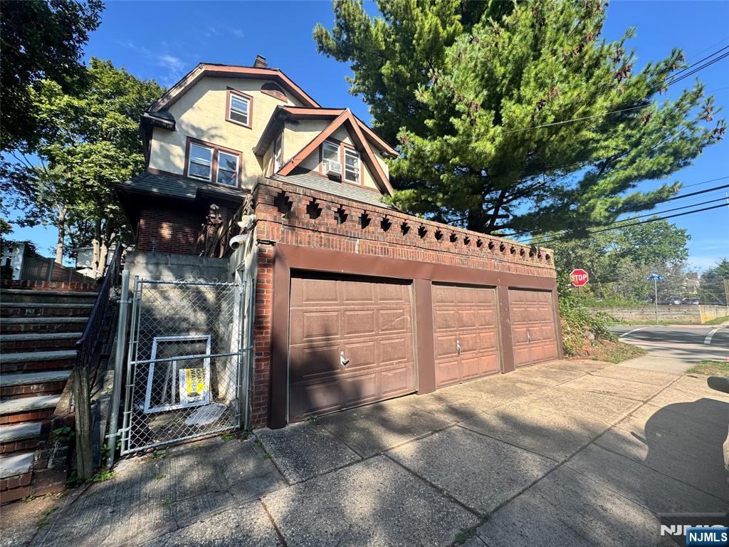 438 North Street Teaneck, NJ 07666 - Photo 2 of 2 a front view of a house with a yard