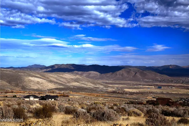 a view of mountain with sunset