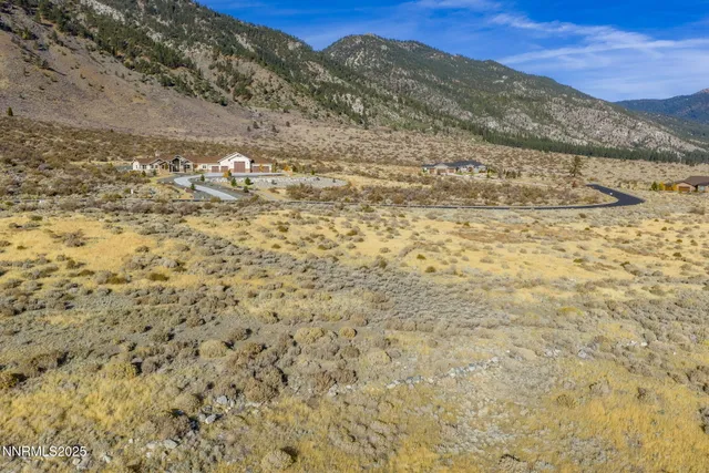 a view of a large window with wooden floor
