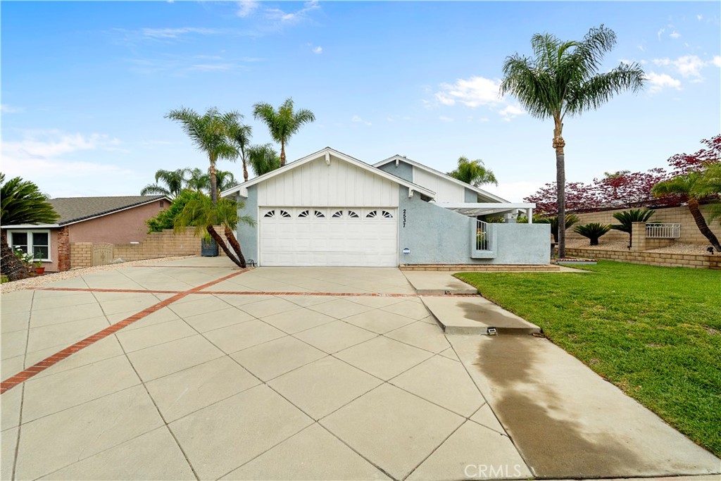 2537 Fulton Road La Verne, CA 91750 - Photo 2 of 43 a front view of a house with a yard and garage