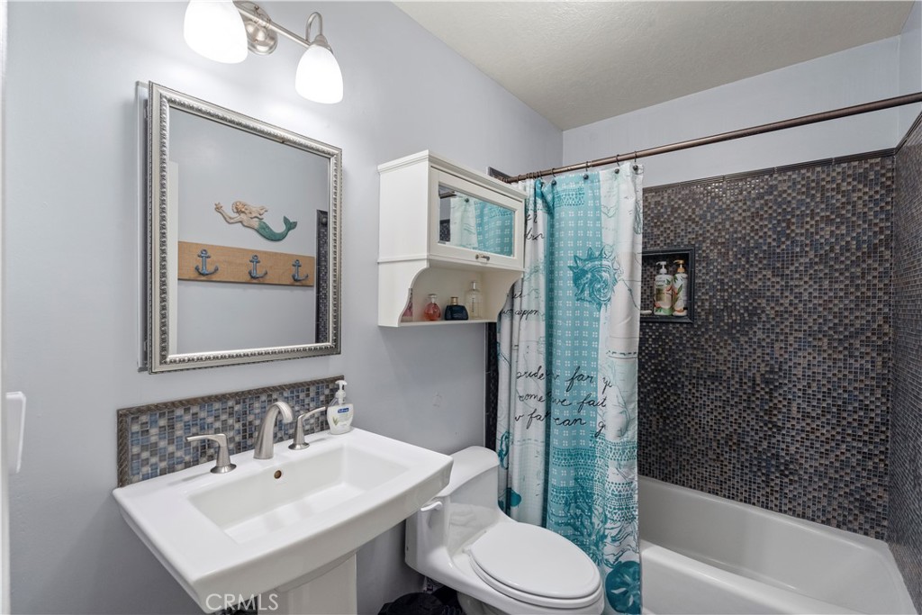 2537 Fulton Road La Verne, CA 91750 - Photo 25 of 43 a bathroom with a sink toilet and shower