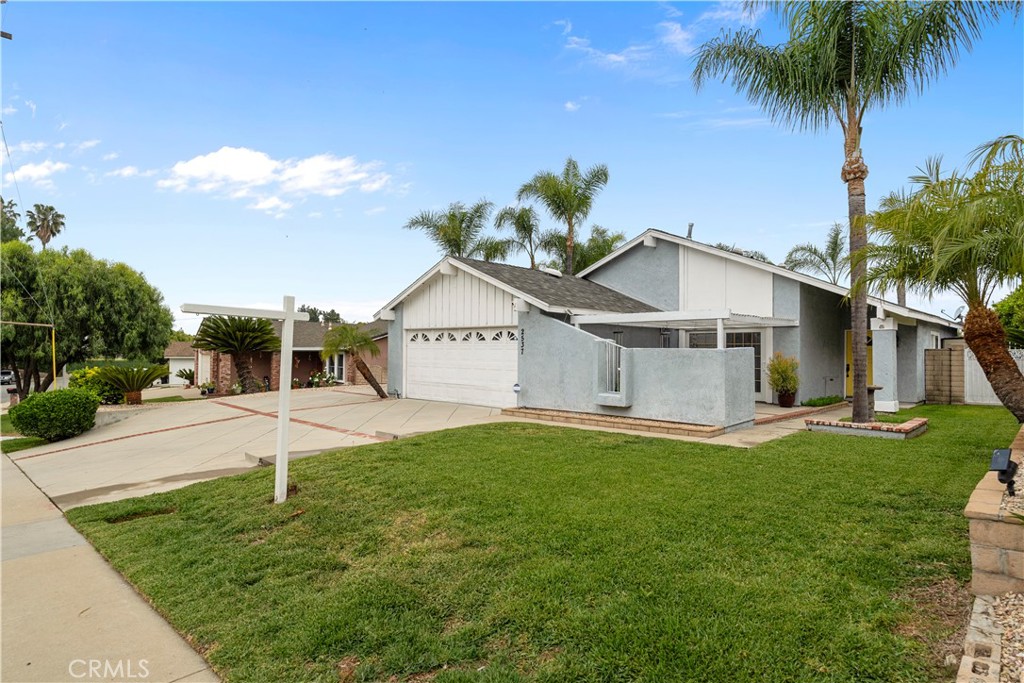 2537 Fulton Road La Verne, CA 91750 - Photo 4 of 43 a front view of a house with a yard and garage