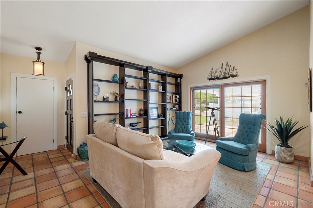 2537 Fulton Road La Verne, CA 91750 - Photo 10 of 43 a living room with furniture and a floor to ceiling window