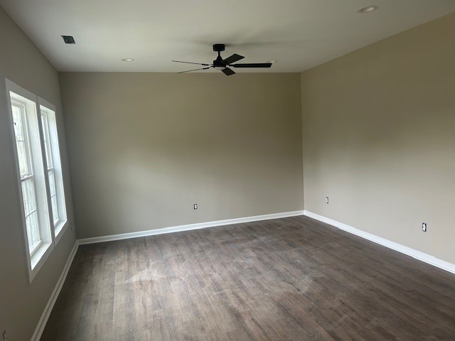 402 North 3rd Street Pulaski, TN 38478 - Photo 7 of 8 wooden floor in an empty room with a window