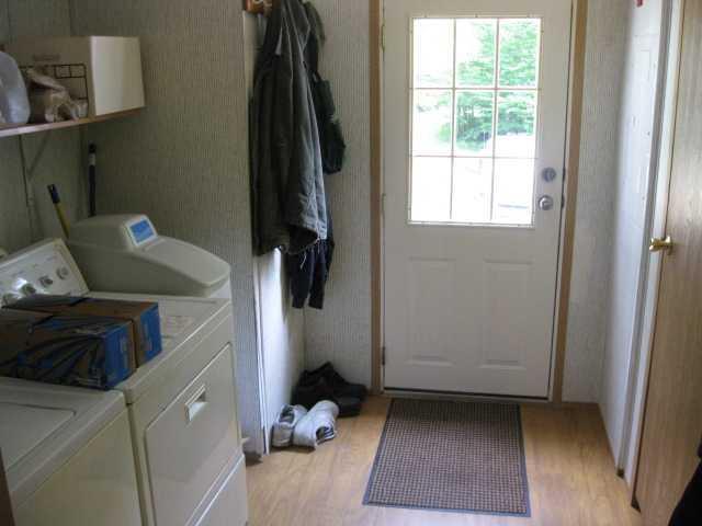 711 Pleasant View Ridge Road South China, ME 04358 - Photo 5 of 13 Entry. Entry with Washer & Dryer