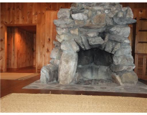 267 Vinton Road Lovell, ME 04051 - Photo 9 of 22 Living Room. Living room fireplace